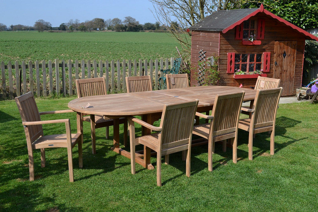 9-piece-teak-oval-outdoor-dining-set